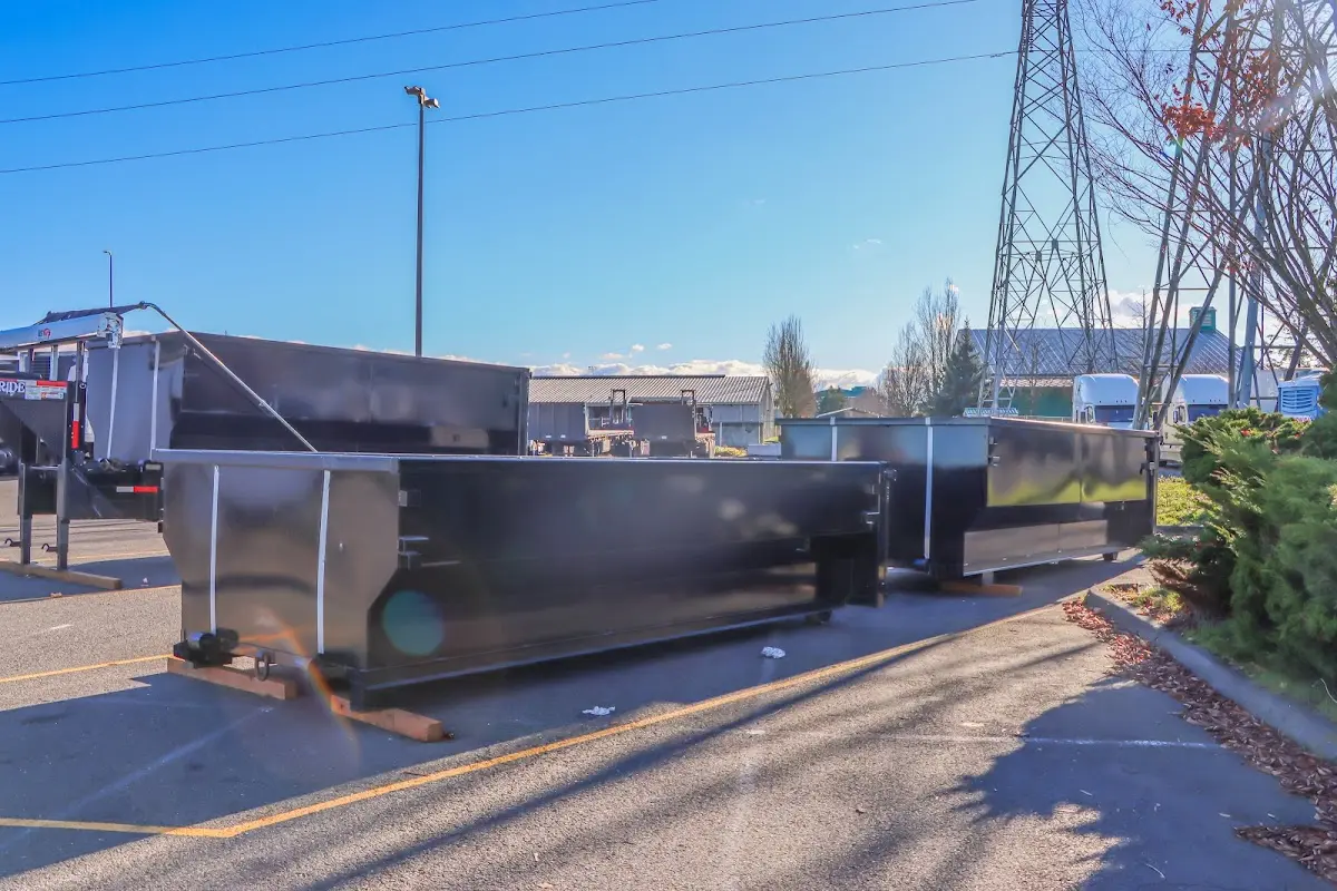 Roll-off dumpster ready for waste disposal at job site for 30 Yard Dumpster Rental in Live Oak